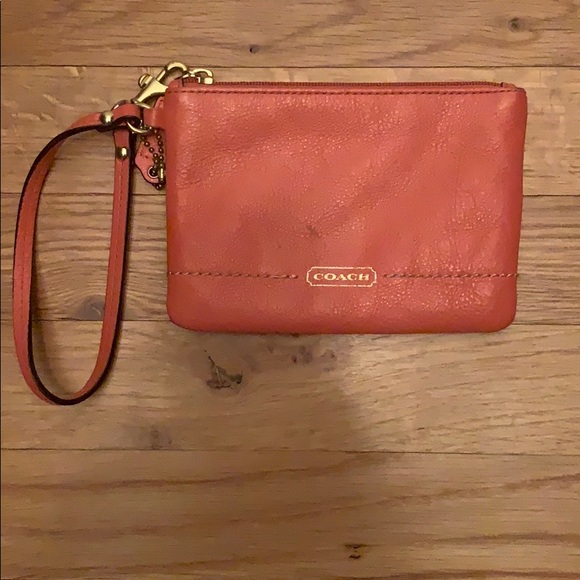 Coach Handbags - Melon Coach wristlet. Great condition!